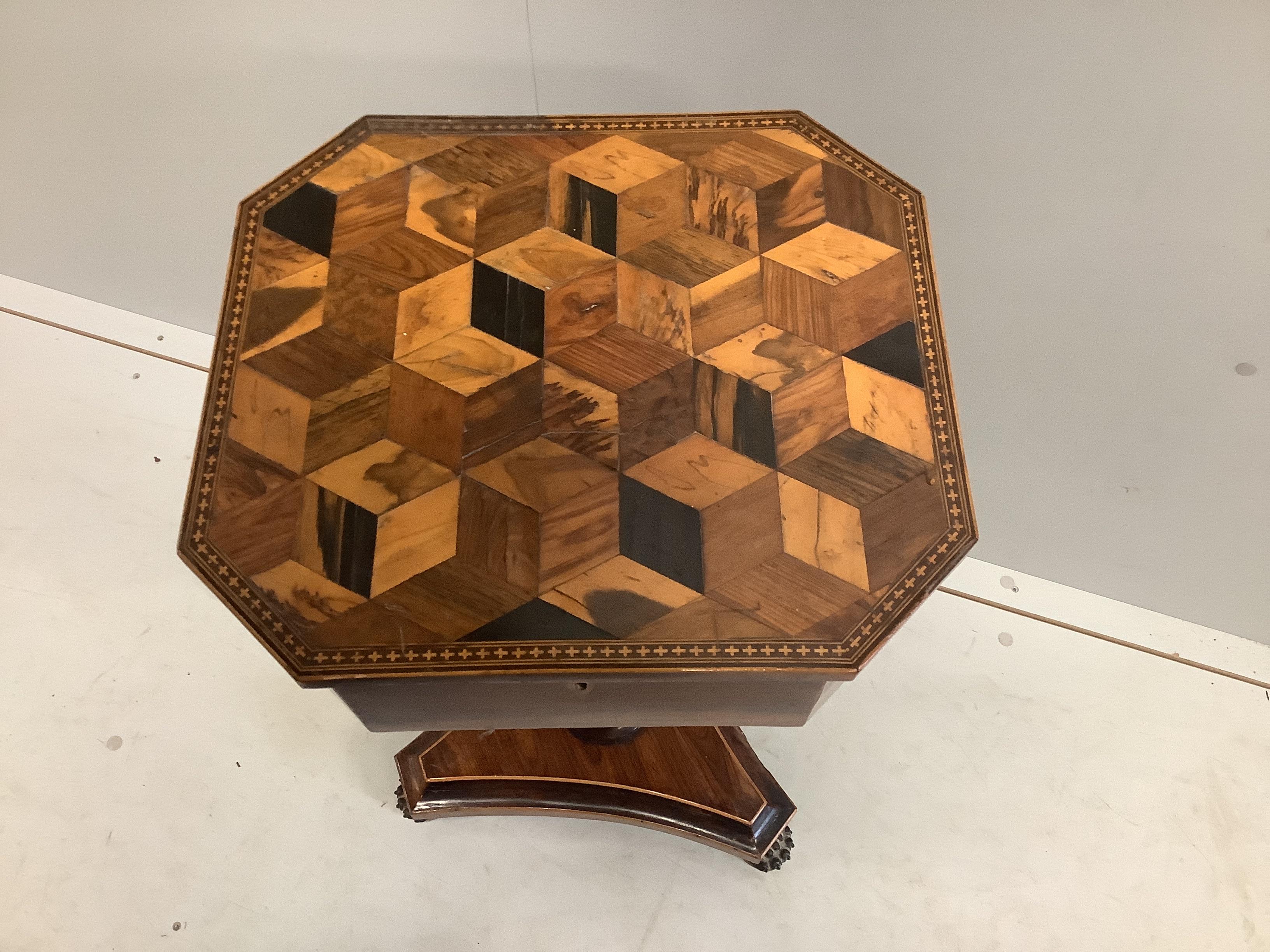 An early 19th century parquetry inlaid octagonal rosewood teapoy, width 38cm, depth 34cm, height 73cm